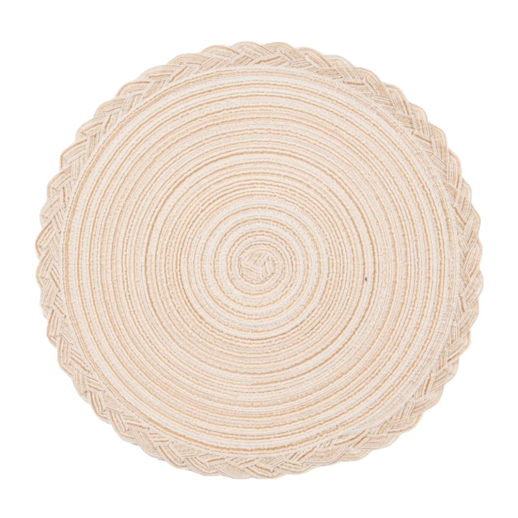 A round braided placemat in a natural beige color, featuring concentric circular patterns and a braided scalloped edge, shown on a solid white background.